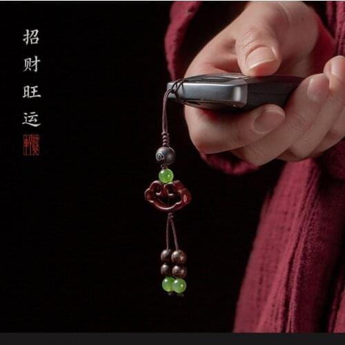 Small leaf red sandalwood wishful pendant male safe car keychain female mobile phone bag small ornaments high-end