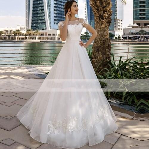 Floor Length Tulle Gown White A-Line Wedding Dresses Scoop Neck Back Bridal Gowns Lace Appliques Vestidos de novia 2021