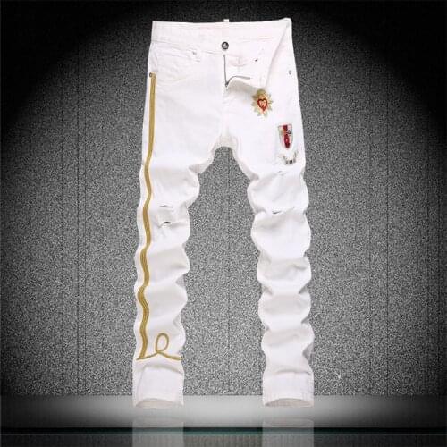 Mens Fashion White Jeans Men Skinny Embroidery Patch Badge Stretch Denim Pants Ripped Hole Nightclubs Singers Trousers