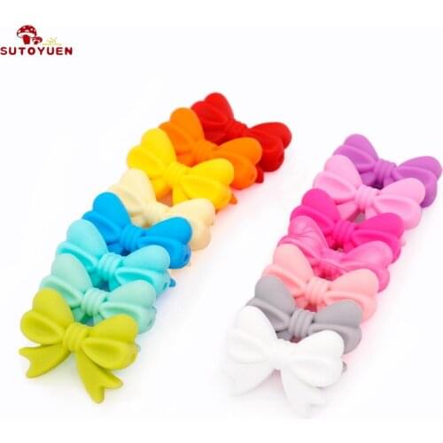 SUTOYUEN 50PCS Bow Tie Silicone Beads Baby Pendants Food Grade Silicone DIY Teething Necklace Jewelry Making Cartoon Bowknot Bea