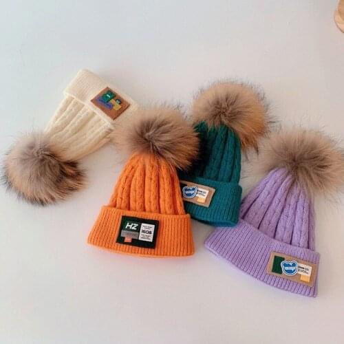 Hot sale 2021 Korean children crochet knitted woolen hat with big hair ball baby cuffs to keep warm in autumn and winter