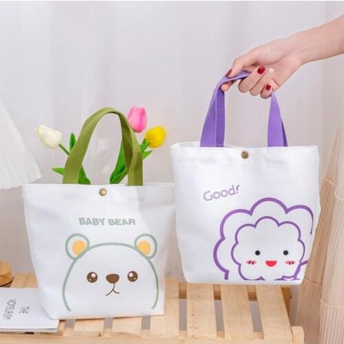 New small and fresh portable canvas bag, ladies hand bag, casual fashion shopping bag, portable storage bag