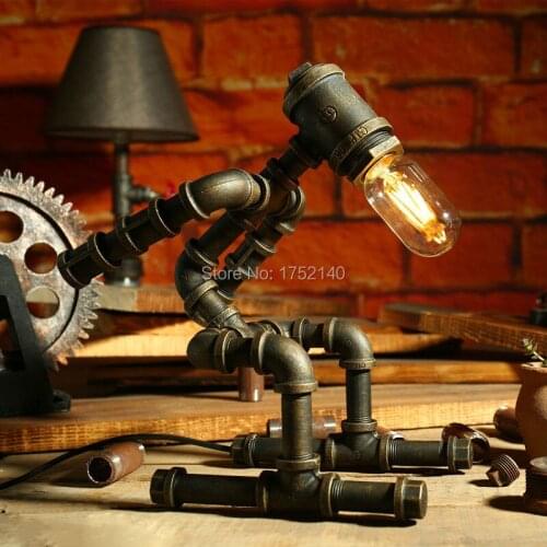 LOFT industrial iron water pipe desk lamp athlete robot lamp retro Sports modeling desk lights dimming table lamp art decor