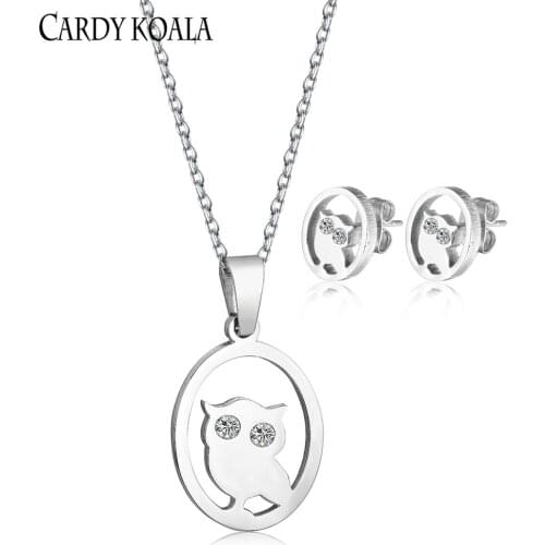 Cold wind titanium steel round brand owl diamond hollow pendant necklace earring set gold-plated childrens earrings first produ