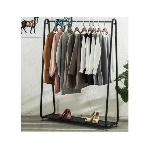 Vintage high-end iron clothing racks. Clothing store shelves. Display rack.88