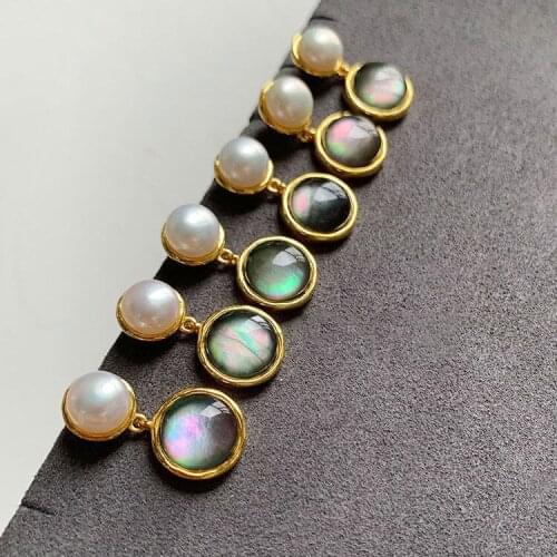 New original synthetic Pearl Ring Earrings Chinese style retro Strange Universe planet Fritillaria creative silver jewelry
