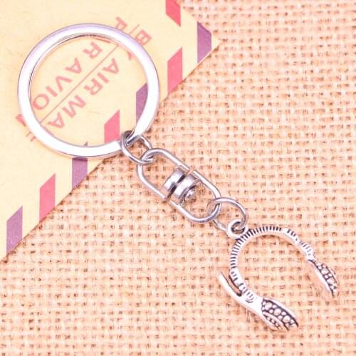 New Fashion Keychain 25x18mm earphone headphones Pendants DIY Men Jewelry Car Key Chain Ring Holder Souvenir For Gift