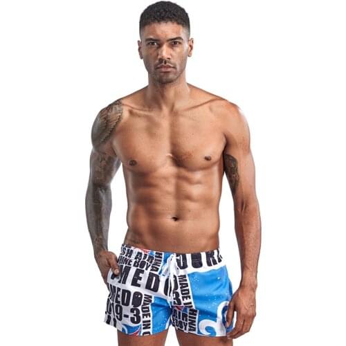 Mens printed three-point beach pants mens brief underwear men fashion printed straight loose sports shorts