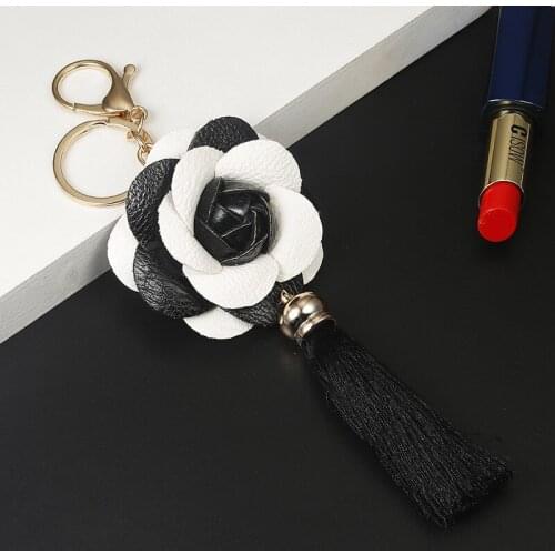 Unisex Leather Tassel keychain camellia bag pendant mobile phone Shell decoration Handbag Car key chain key ring Christmas Gift