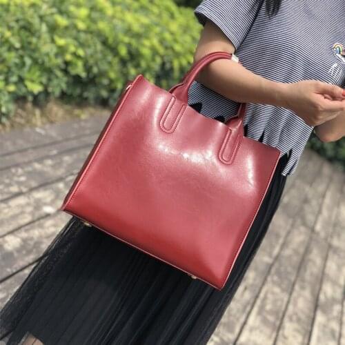 European and American foreign trade leather large bag womens simple oil wax leather vertical version Portable Single Shoulder M