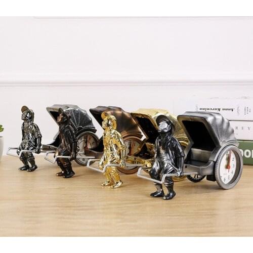 Creative ornaments retro man-pulled rickshaws clock Desktop bedside pointer type clock alarm clock plastic crafts for bedroom