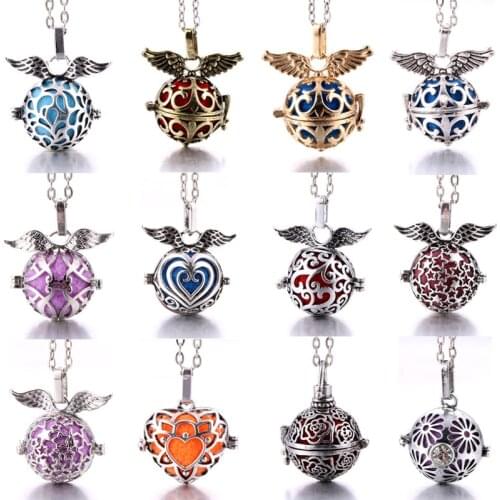 New Heart wing Aromatherapy lockets Vintage copper Perfume Aroma Diffuser Pendant Necklace Bell ball volcanic stone cage