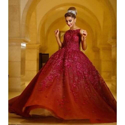 Luxury Lace Ball Gown Prom Dresses Appliqued Backless Jewel Neckline Beaded Evening Gowns Sweep Train Formal Party Dress