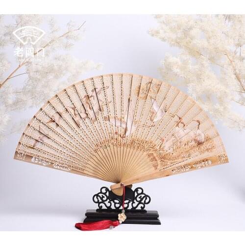 India laoshan wingceltis sandalwood door suzhou old Chang sandalwood fan gift craft high-end fan - pine crane live