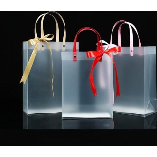 100pcs/lot PP plastic handbag PVC gift wrapping wedding gift wedding gift wedding candy bag With silk ribbon clothing bag