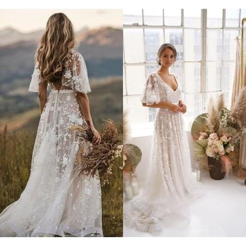 Rustic Boho Party Wedding Dresses 2021 V-neck Backless Ruffles Sweep Train Lace Applique Country Wedding Gown vestido de novia