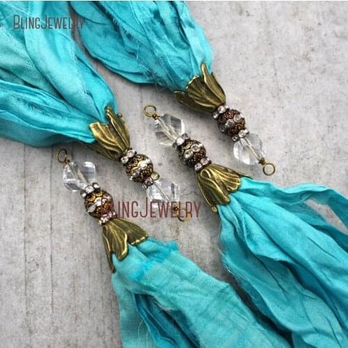 Turquoises Sari Silk Tassel Pendant Antique Bronze Cap and Crystal Accent PM9119