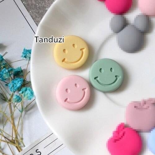 Tanduzi 100PCS Cute Smiling Face Resin Flatback Cabochon Scrapbooking DIY Fashin Bow Tie Resin Hair Bow Center Deco Parts
