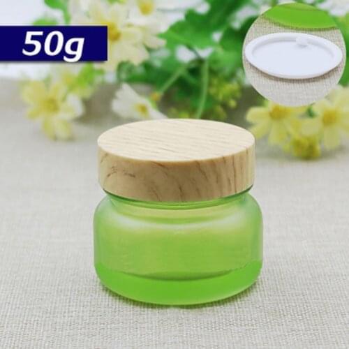 50G frosted green glass cream jar with white/wooden shape lid for night cream/eye cream/essence/moisturizer/hair wax packing