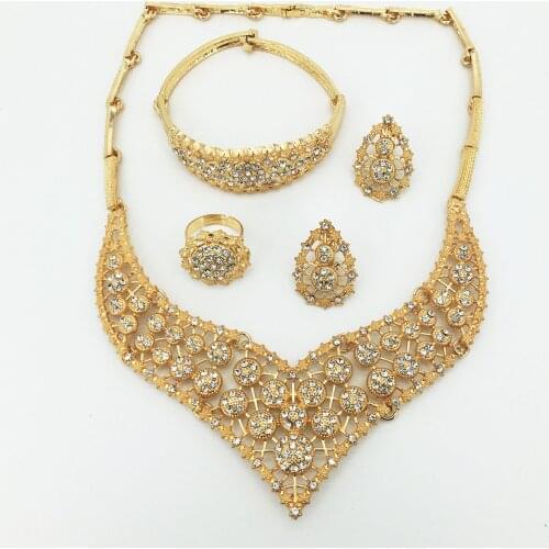 Diverse selection of stylish wedding Dubai African Jewelry collection gold necklace earrings romantic woman bride jewelry