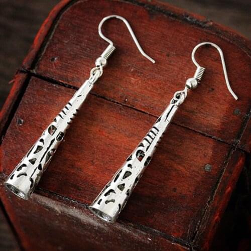 Retro Fashion Hollow Ethnic Style Earrings Bohemian Exquisite Carved Totem Earrings Alloy Torch Earrings Womens Jewelry