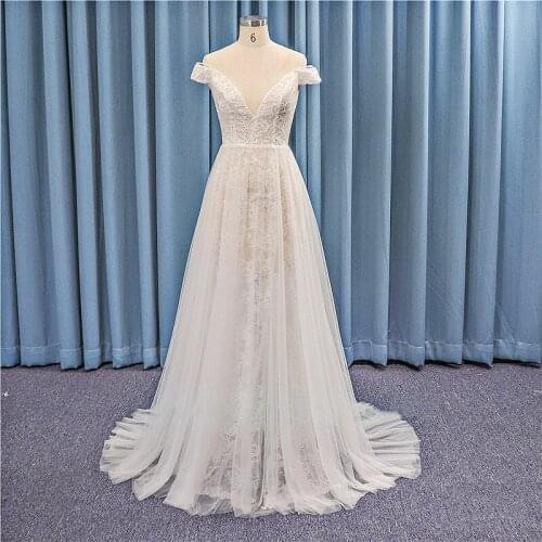 2021 Sexy Wedding Dresses Off The Shoulder Lace Appliqued Bride Dresses A Line Elegant Tulle Illusion Boho Wedding Bridal Gowns