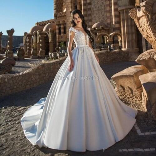 2021 Satin Wedding Dresses Ball Gown Cap Sleeves Deep V Neck 3D Flowers Buttons Back Court Train Vestido De Noiva Bridal Gowns