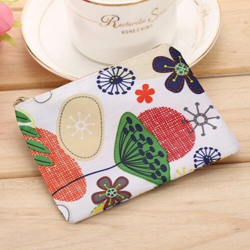 Polyester ladies coin purse key chain snack bag USB cable earphone bag mini cute oval zipper cartoon simple creative storage bag