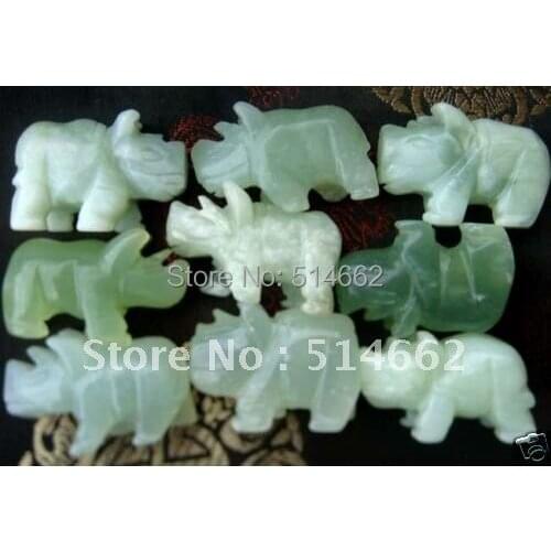 A JADE FENG SHUI RHINOCEROS ORNAMENT FOR PROTECTION