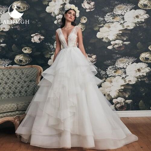 Aedmgh Ball Gown Empire Wedding Dresses 2021 V- Neck Sleeveless Ruffles Train Vestido De Novias Appliques Backless Bridal Gowns