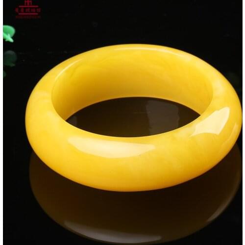 The new female chicken oil beeswax Bracelet yellow amber bracelet