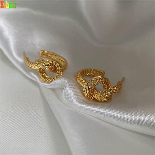 Kshmir Simple rod-knot earrings female Ins fashionable high - grade metallic gold earrings temperament design earrings