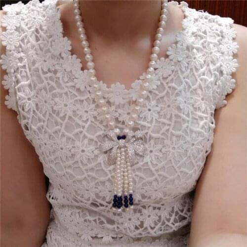 Hot sell natural 9-10mm white freshwater pearls Lapis lazuli bowknot accessories long necklace sweater chain fashion jewelry