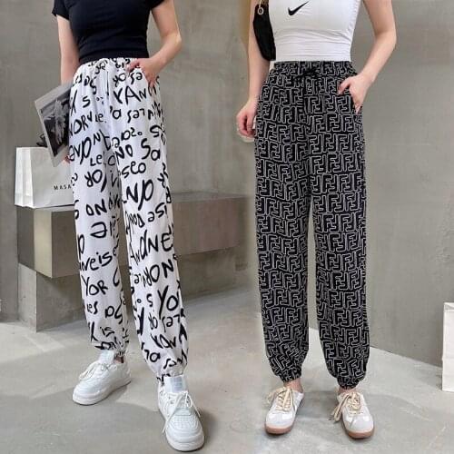 Summer new womens Hong Kong wind pants ice silk print high-waisted chiffon loose Harlem pants nine-point toe casual pants