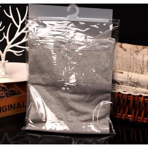 300pcs/lot Transparent waterproof PVC Cloth Storage Bag With Hanger Plastic Packaging Button Seal Bag Clothes Scarves Hook Bags
