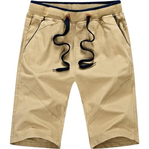 2021 Summer Solid Color Casual Shorts Men Elastic Waist Drawstring Shorts Plus Size 5XL Beach Fashion Stitching Shorts