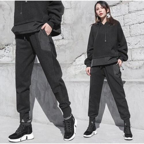 New European and American Autumn and winter plus-size womens elastic waist belted harem pants trend