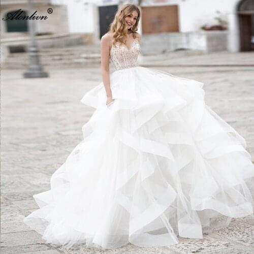 Alonlivn Luxuries Rhinestones V Neckline Of Spaghetti Strap A Line Wedding Dress With Ruffles Skirt Backlessrt