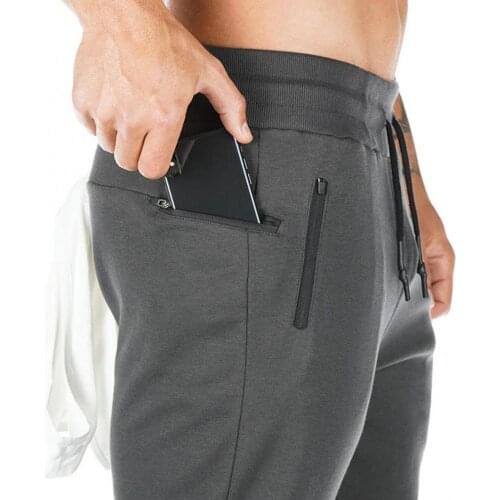 Men Autumn Winter Joggers Sweatpants Drawstring Pockets Men Casual Pants Solid Color Gyms Fitness Workout Sportswear Trousers