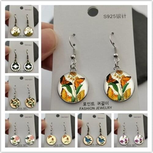 The most fashionable new retro butterfly glass cabochon dome ladies earrings DIY handmade earrings making jewelry gifts