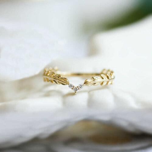 Womens Xiaoqing new spring leaf feather ring fold tail ring new Gold Color fold tail ring