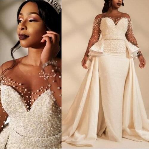 2020 African Mermaid Wedding Dresses Overskirts Sheer Neck Long Sleeve Pearls Neaded Plus Size Garden Country Bridal Gowns