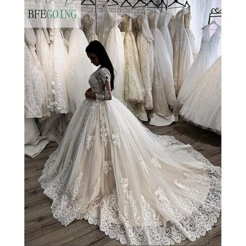 Luxurious Ivory Lace Tulle Scoop Long Sleeves Bridal gown Floor-length A-line Wedding dress Chapel Train Custom made