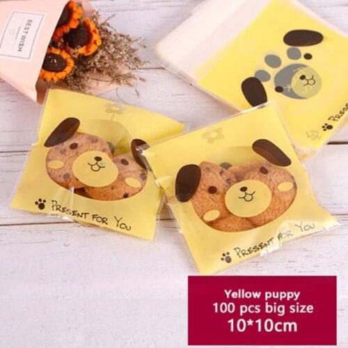 100pcs Snacks Self Adhesive Packaging Bag Yellow Background Cartoon Transparent Dog Head Soap Biscuits Birthday Party Gift Bag
