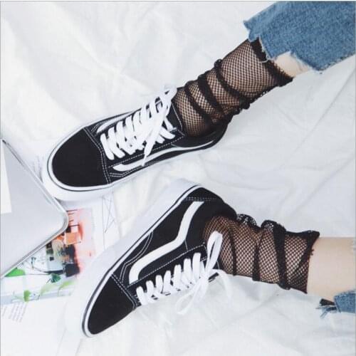 Harajuku goth punk series cool female hollow thin black fishnet socks women sexy socks Edge Curl Solid Cute Funny Socks