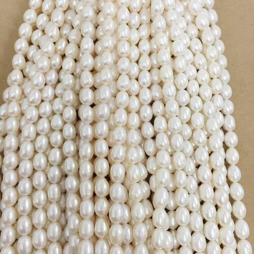 High luster pearl beads ,100% nature freshwater pearl material with oval shape,rice pearl diameter 7-8 mm, length 9-10 mm