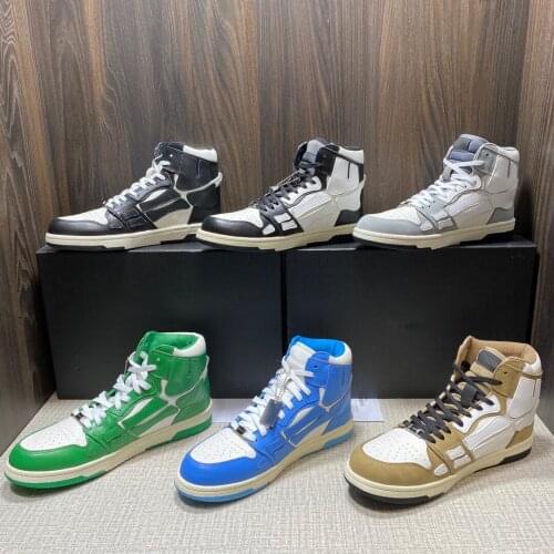Two-tone with hollow/carved mid-top cool design round head skull applique splice colors couple street fashion brand sneakers