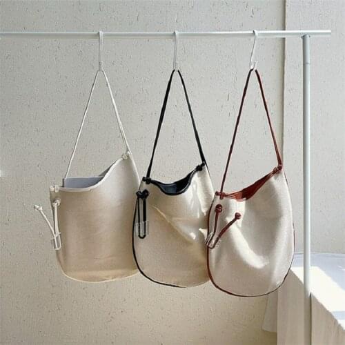 Korean female bag new simple personality canvas bag popular stitching shoulder bag casual all-match irregular bucket bag