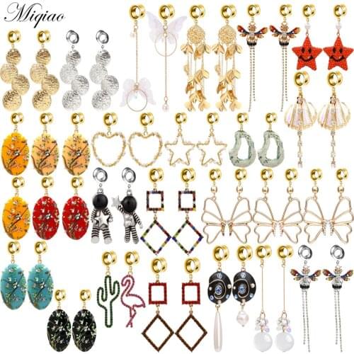 Miqiao 2pcs Korean Temperament Long Asymmetric Bow Crystal Pearl Tassel Ear Piercing Jewelry
