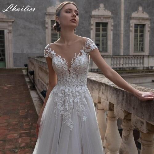 Lhuilier A Line Scoop Neck Tulle Wedding Dresses Floor Length Cap Sleeves Backless Bridal Gowns with Lace Appliques